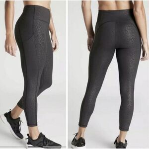 ATHLETA ULTIMATE STASH POCKET EMBOSSED 7/8 TIGHT Size Medium